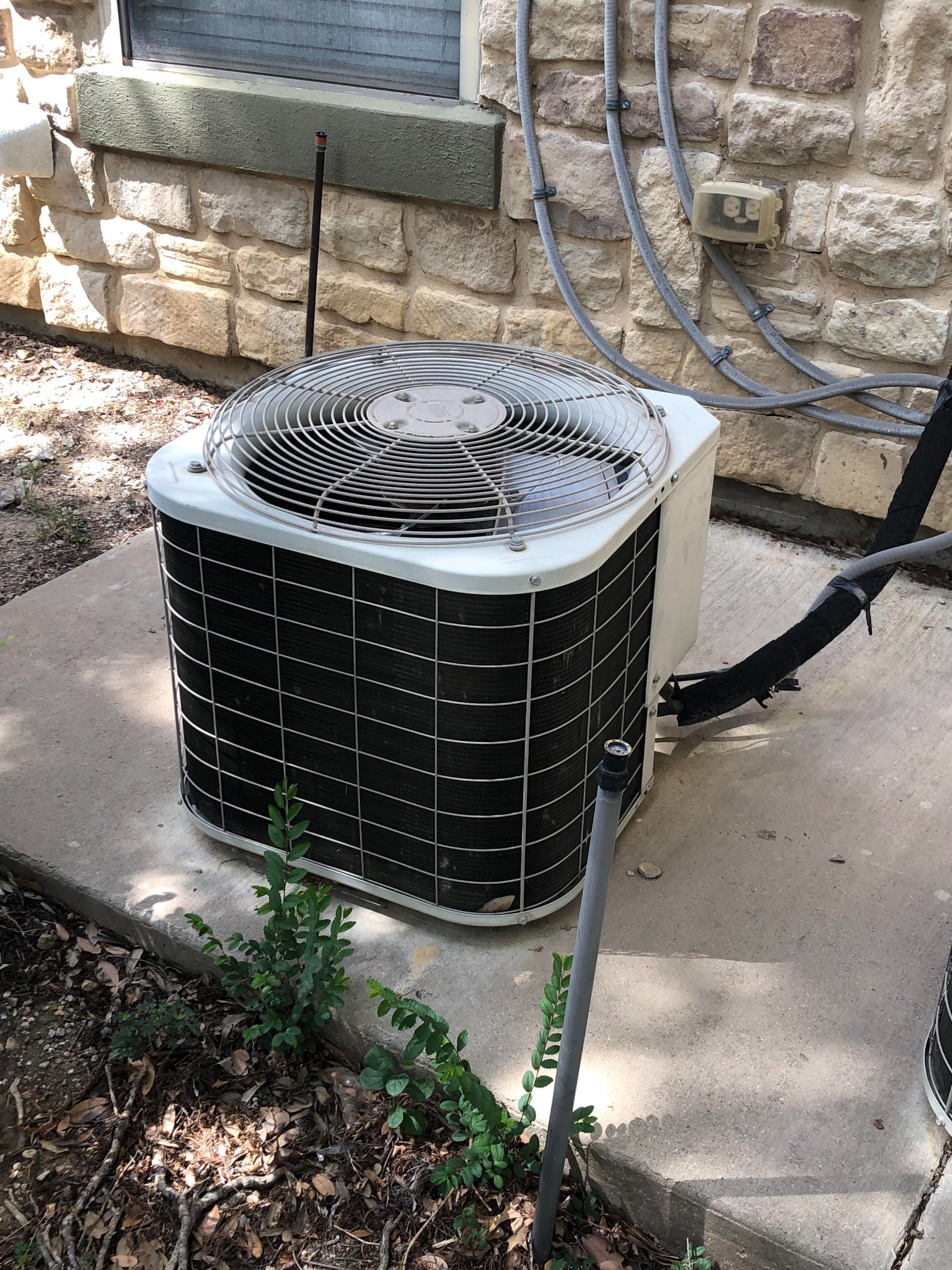 Central AC unit outside a home